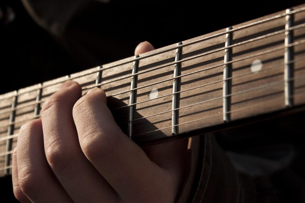 guitar, music, rock, musical instrument, guitar player, street musician, guitar, guitar, guitar, guitar, guitar-1180744.jpg