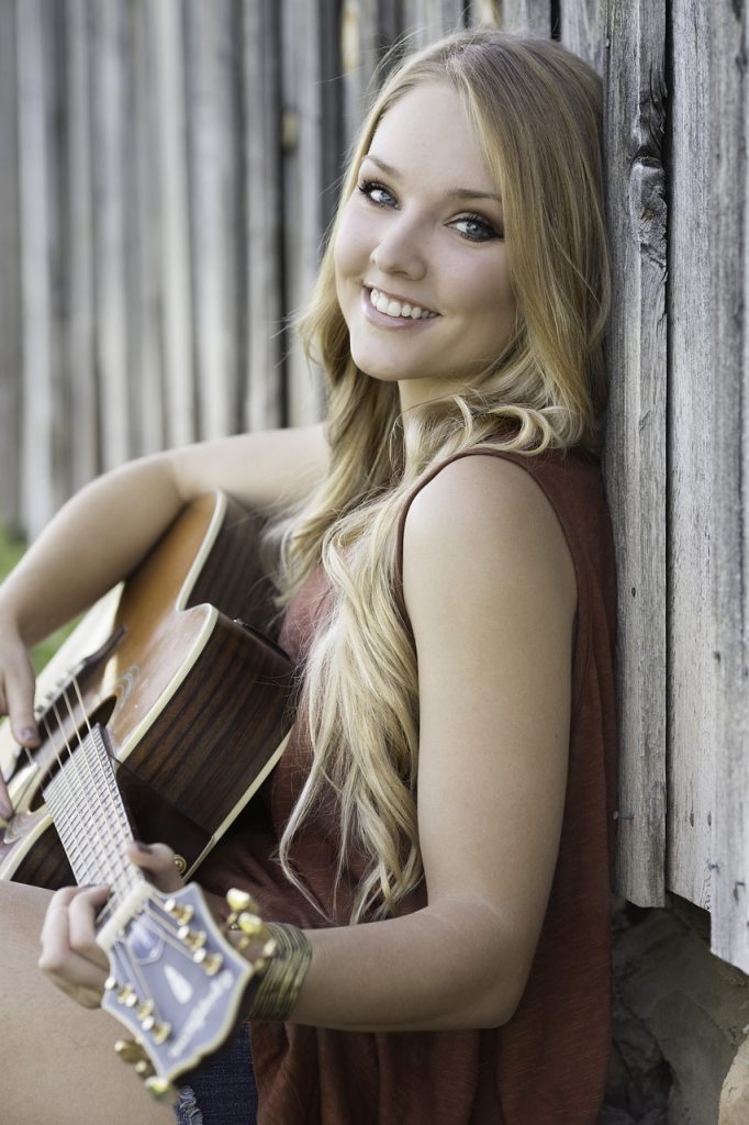 woman, guitar, music, playing guitar, girl, young, smile, happy, beautiful, musician, nature, guitarist, musical instrument, acoustic guitar, summer, country, portrait-944262.jpg